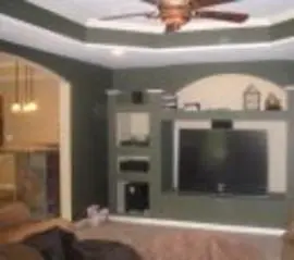 A living room with a couch and television