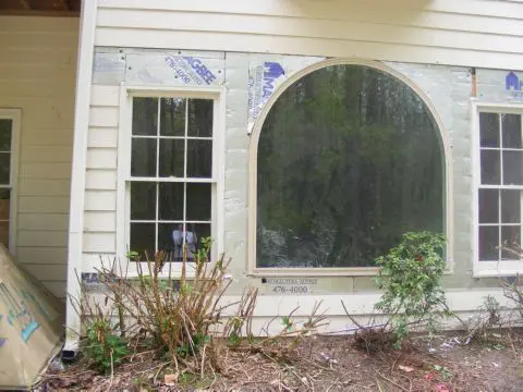 A house with a window that has been painted.