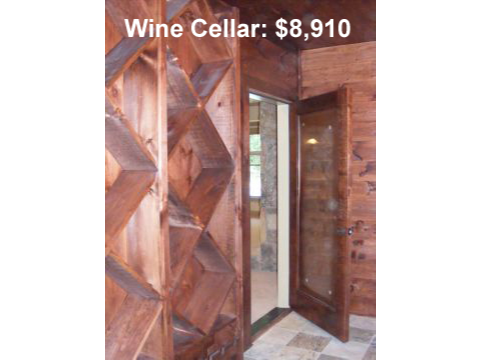 A wine cellar with wood paneling and tile floor.