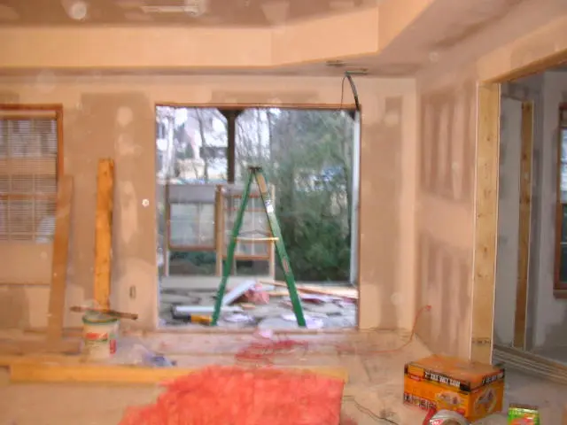 A room being remodeled with the walls removed.